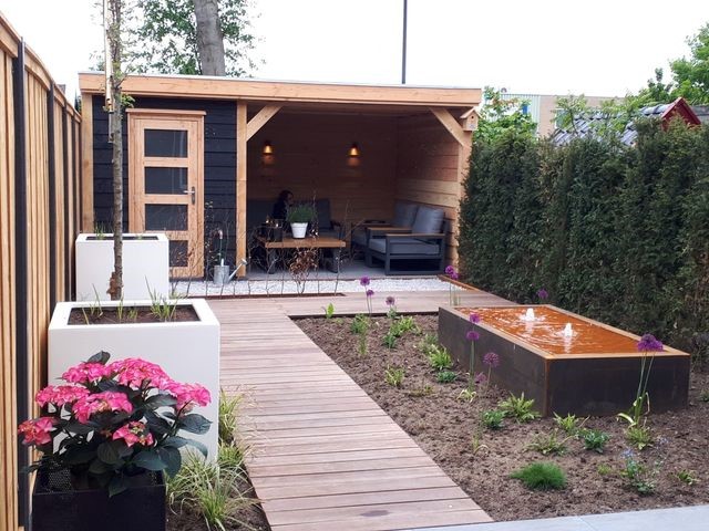 Overkapping platdak + berging Aardenburg